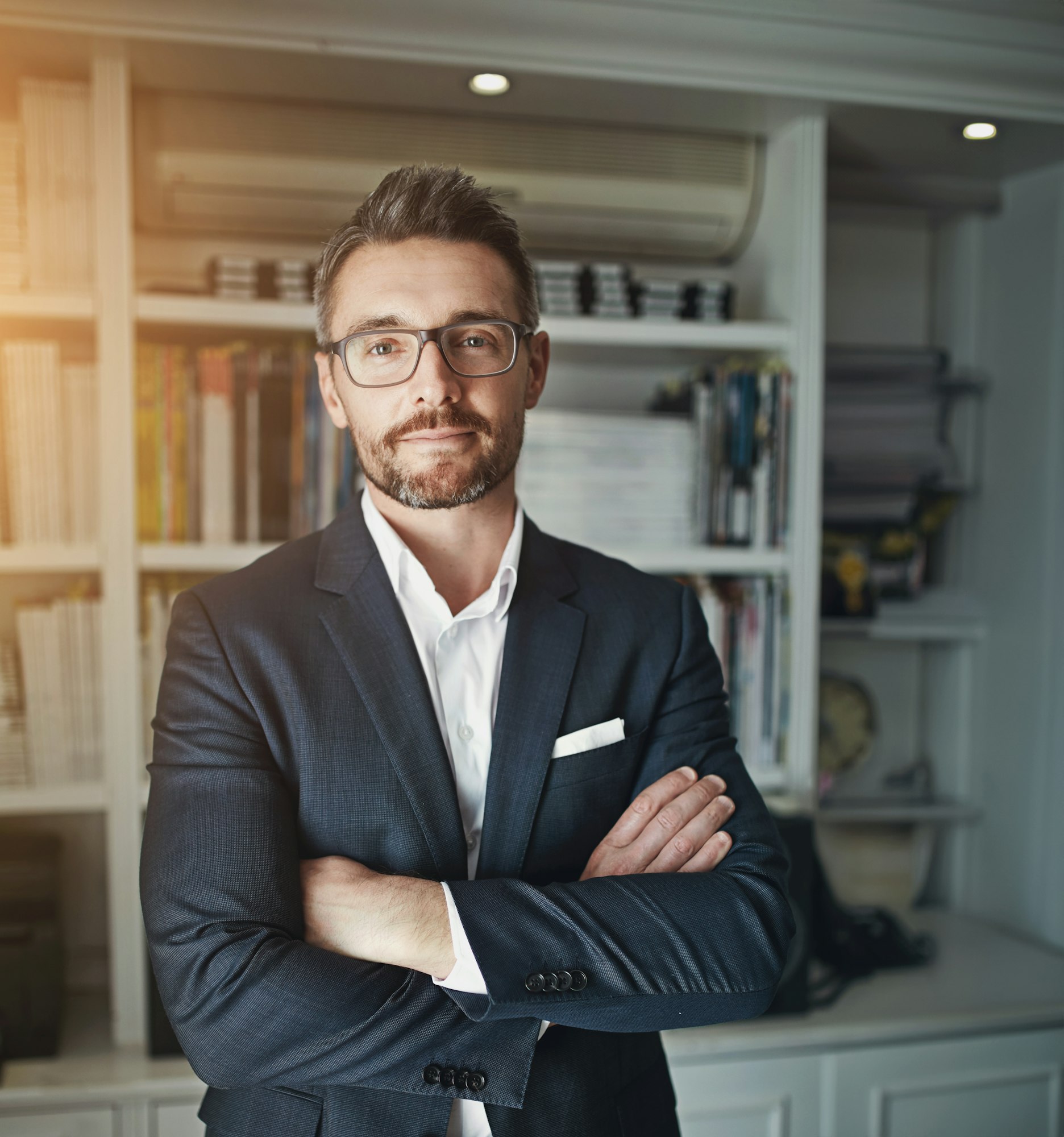 Man, arms crossed and portrait of advocate in office for confidence, ambition and legal job. Smile,